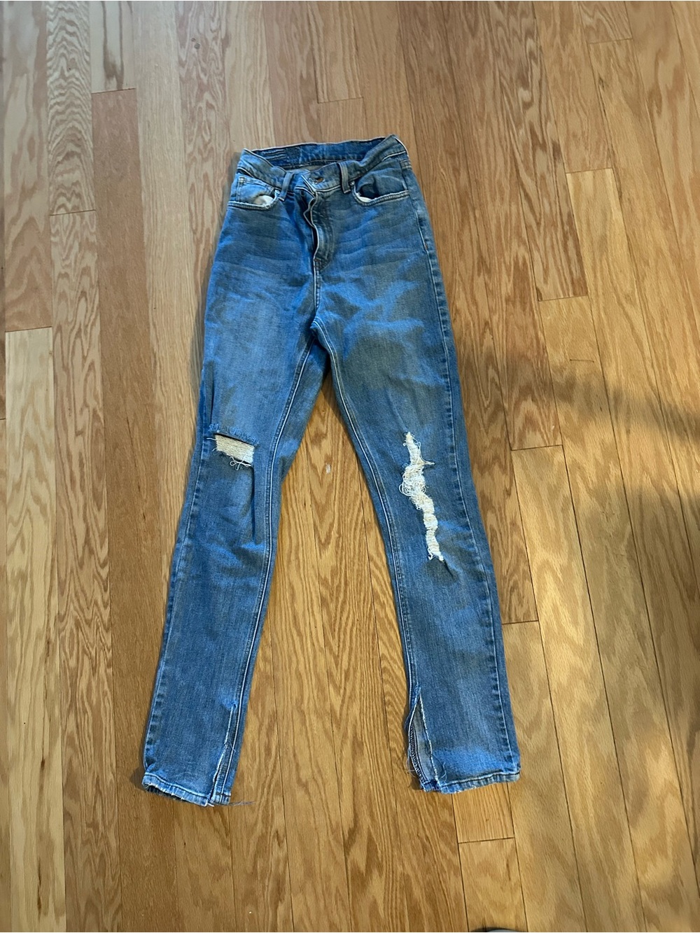 REVICE Distressed Blue Skinny Jeans with Knee + Cheek Rips